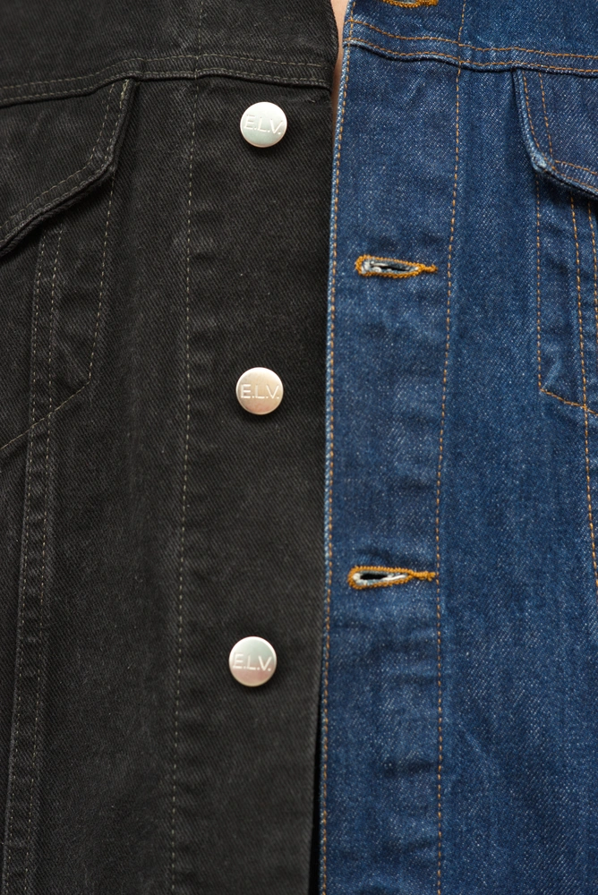 A close up of the E.L.V. Denim jacket, which the 80s model is wearing.